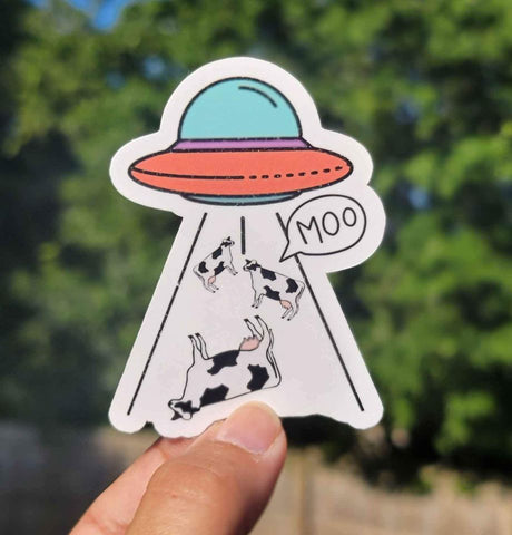 Aliens Abducting Cows Sticker